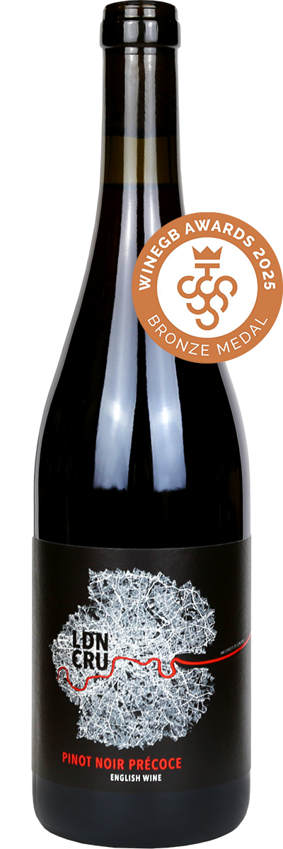 Bottle of London Cru Pinot Noir Précoce wine featuring a 2025 WineGB bronze medal badge